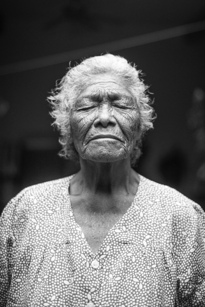 Older woman reflecting thoughtfully representing wisdom and identity in later life